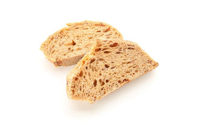 Wheat bread pieces isolated on blank background. Bakery products