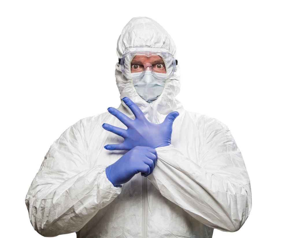 Man With Intense Expression Wearing HAZMAT Protective Clothing
