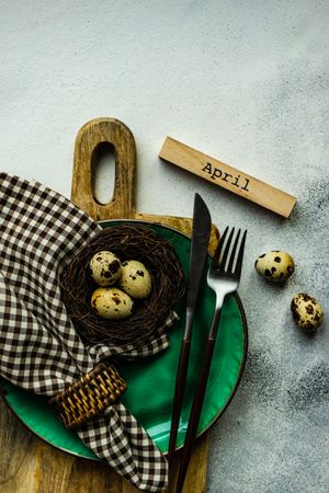 Easter table setting with small quail eggs