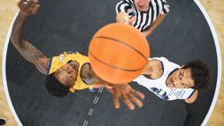 Basketball Tournament Final: Diverse Yellow and White Teams Compete at Center Court for Jump Ball that Starts the Game.