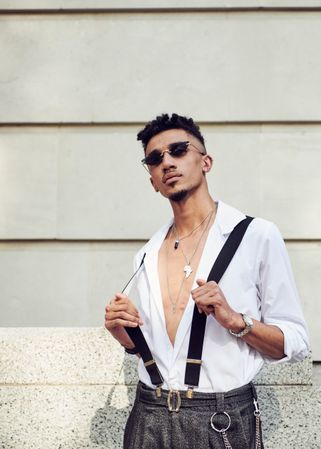 London, England, United Kingdom - September 15th, 2019: Man with open chest shirt and suspenders