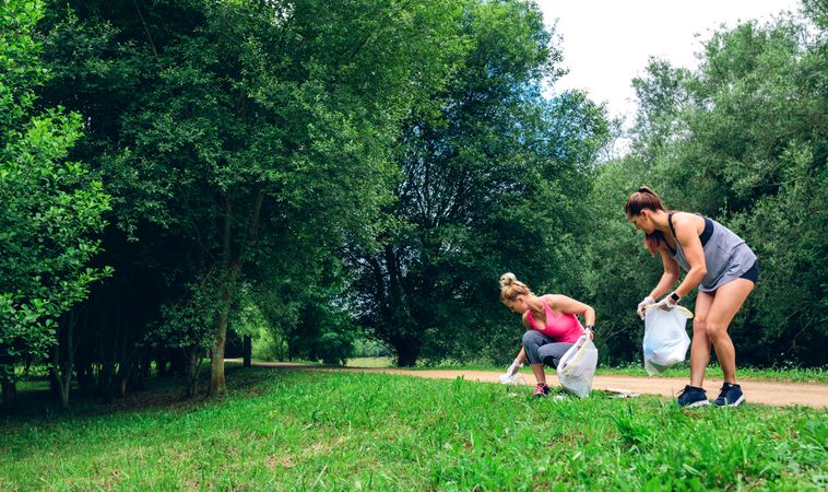 Two woman doing plogging