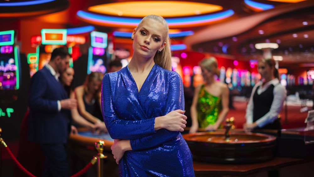 In a Modern Casino Setting: Gorgeous Blond Woman Posing Confidently