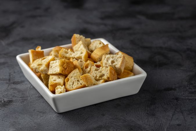 Delicious crunchy croutons on the table.