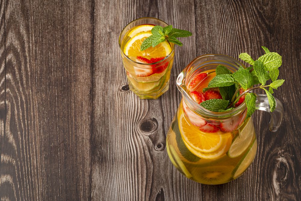 Water flavored with fresh summer fruit.