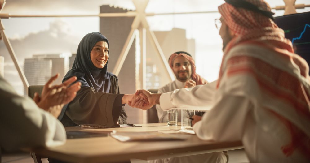 Muslim Businesspeople Closing a Business Deal at a Corporate Modern Office.