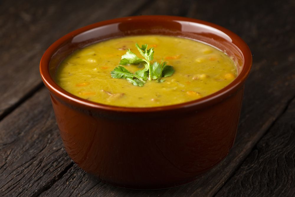 Pea soup. Bowl with pea soup on the table