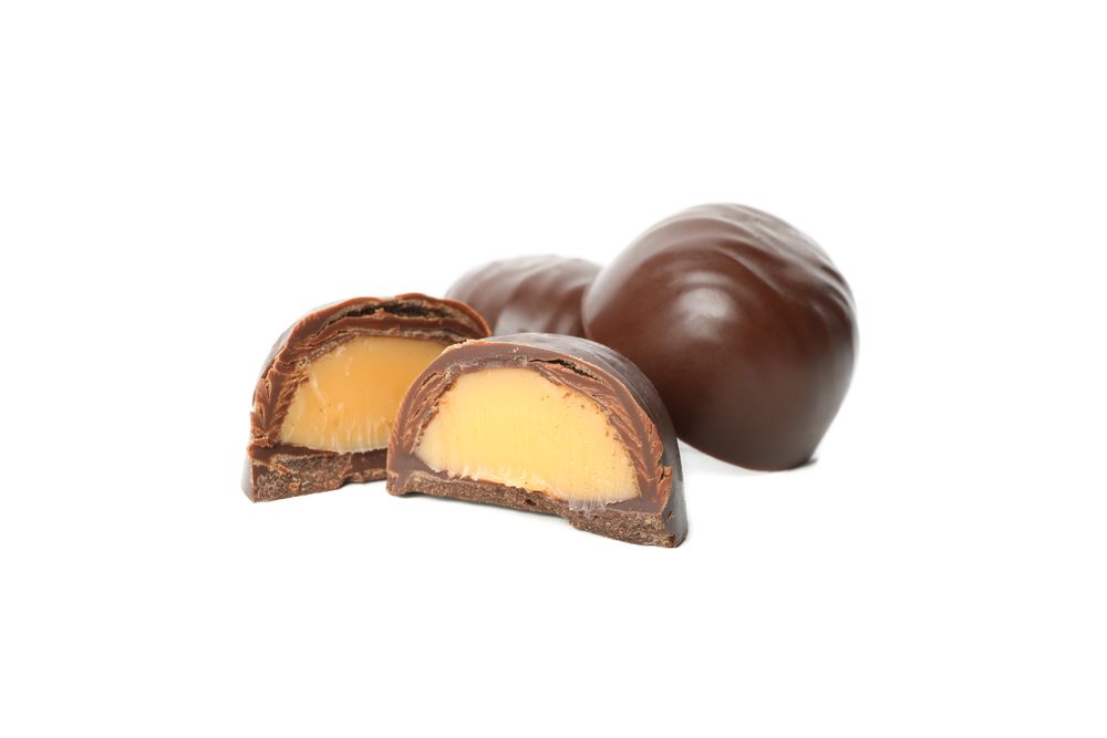 Tasty chocolate candies isolated on plain background