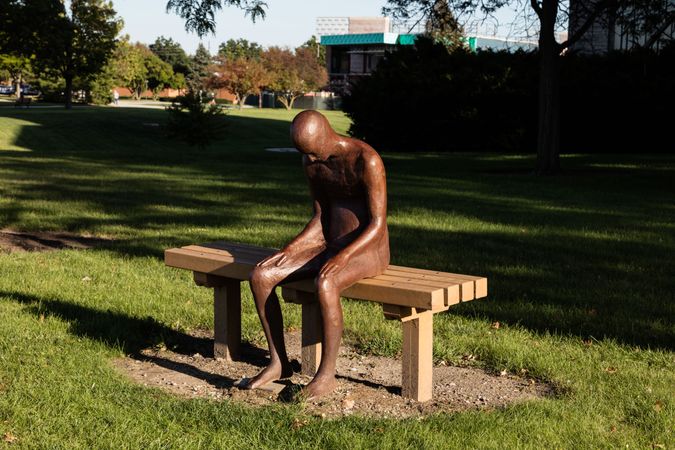 Cast-iron sat on bench, on the campus of Valparaiso University in Valparaiso, Indiana