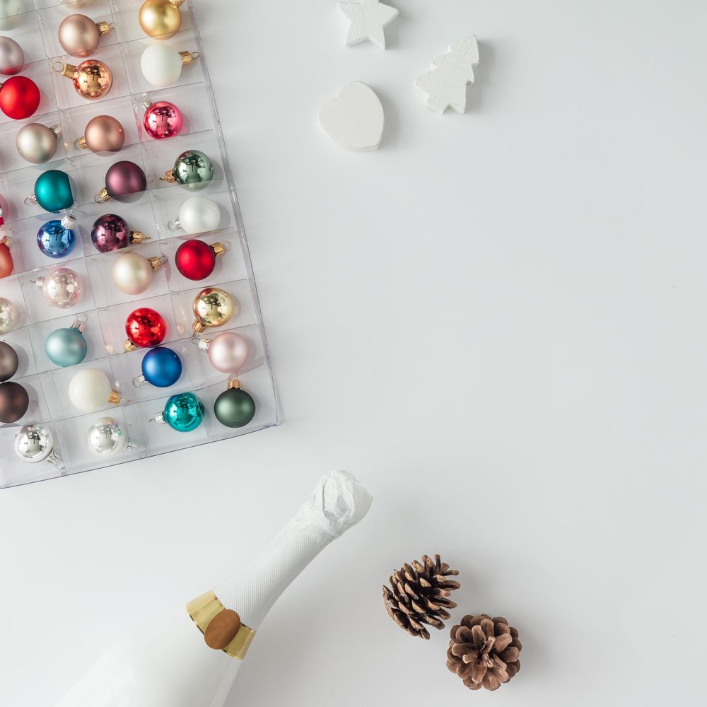 Bauble decorations ordered in box with bottle of Champagne