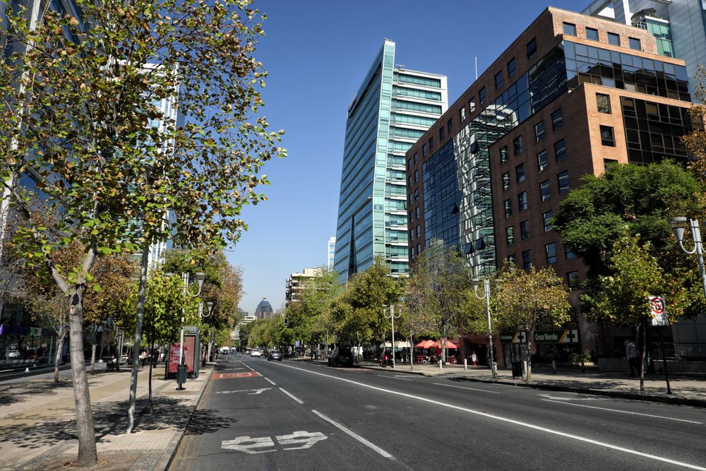 Cars on road in Barrio El Golf neighborhood in Santiago, Chile