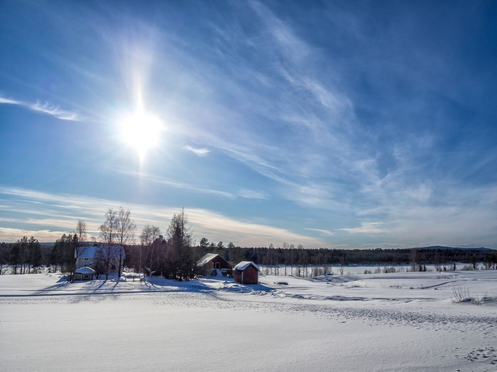 Lodges in a wintry landscape