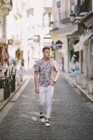 Handsome man standing on the street