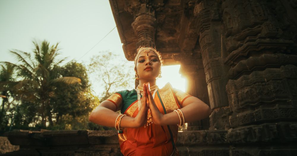 Expressive Woman Wearing Beautiful South Asian Attire Dancing with Energy
