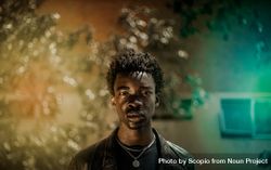 Portrait of African young man in dark leather jacket bxKlB4