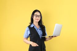 Asian Business Woman with Casual Fashion Wearing Glasses, Holding Laptop