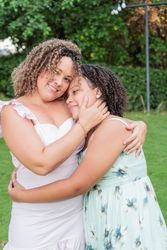 Latina mother with teenage daughter in park