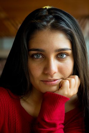 Young charming woman looking at camera