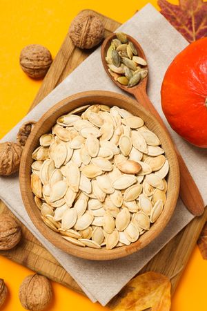Cooking ingredients for fall season - pumpkin seeds, pumpkin