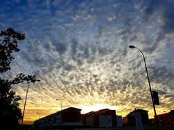 Sunset at city of Granada with beautiful clouds