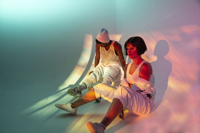 Dancers under violet illumination