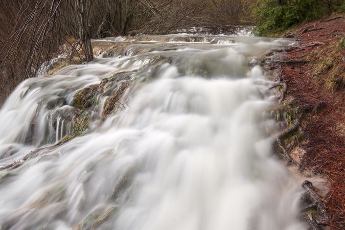 Wonderful waterfall near tree