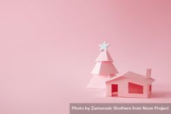 Pink Christmas tree, with house on pink background 0vwAd5