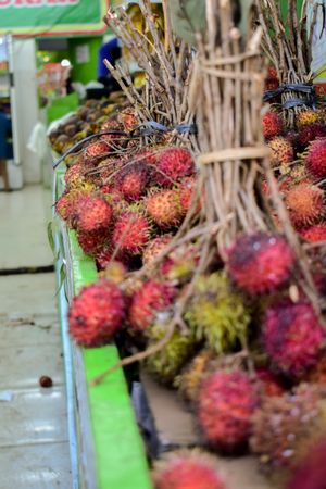 Bunch of lychee fruits for sale in store