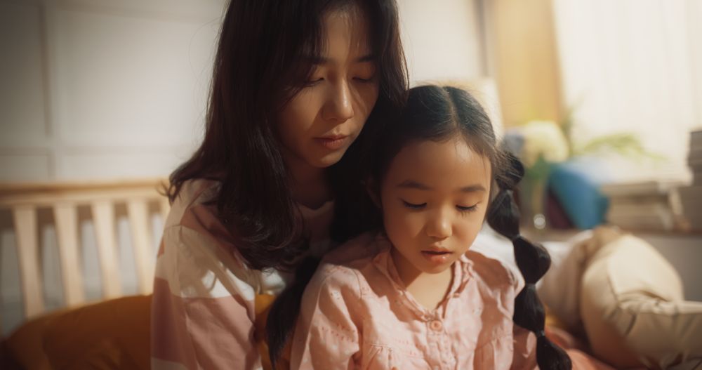 Korean Mother and her Daughter Having a Peaceful Morning Together, Talking and Bonding.