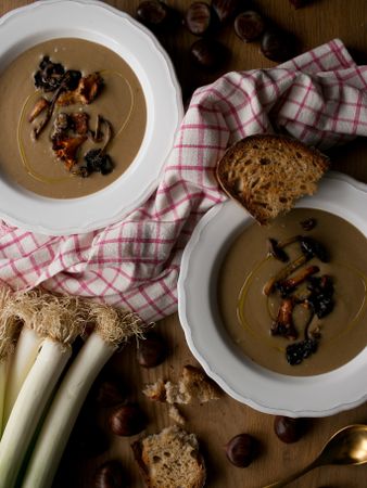 Bread and scallion near chestnut soup