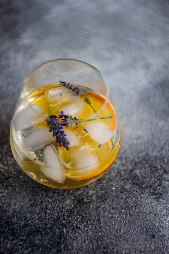 Drink with orange slice and lavender