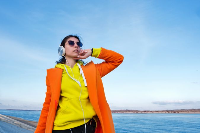 Woman listens to music with headphones