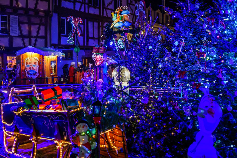 Purple Christmas lights in in square in Colmar, Alsace, France