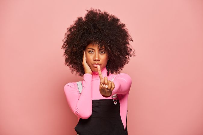 Serious Black woman showing no gesture