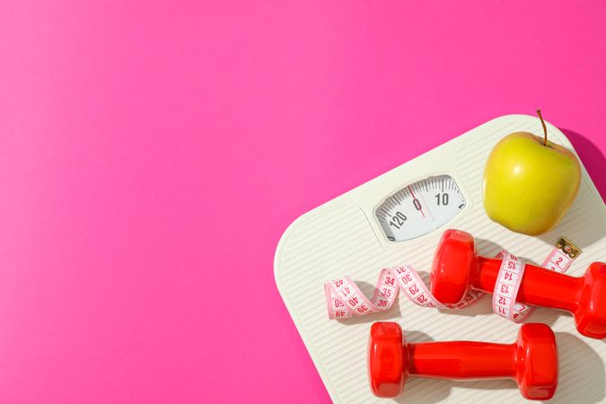Flat lay composition with loss weigh accessories on color background