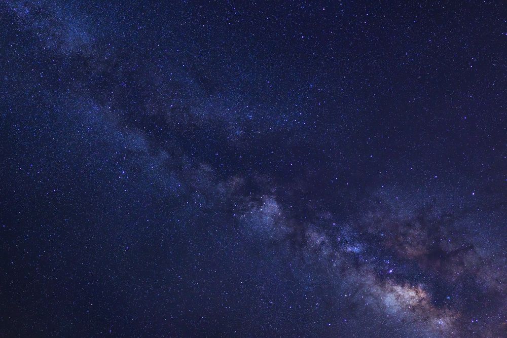 Starry night sky and milky way galaxy with stars and space dust in the universe