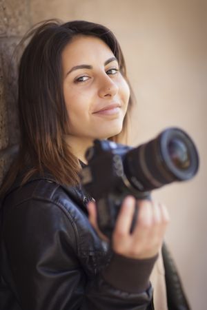 Female Photographer Holding Camera