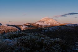 Clouds near snowy mountain