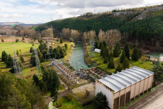 Contemporary hydroelectric power station in landscape