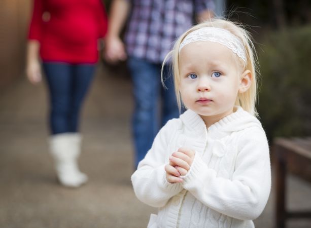 Adorable Little Girl with Her Mommy and Daddy Portrait