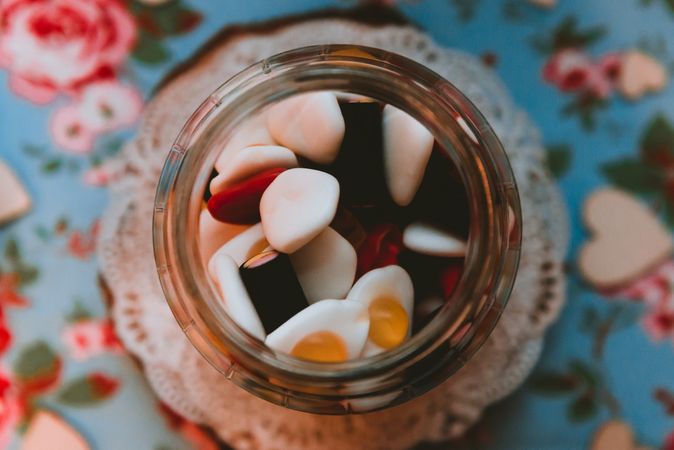 Sweet candies in can on table