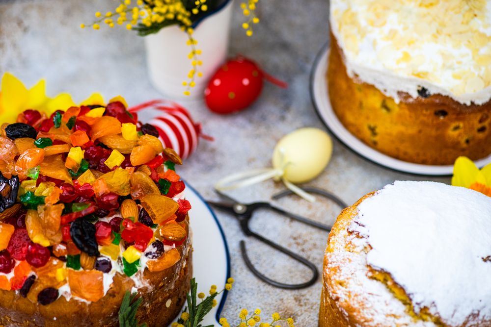 Easter food concept with traditional cake and colorful eggs