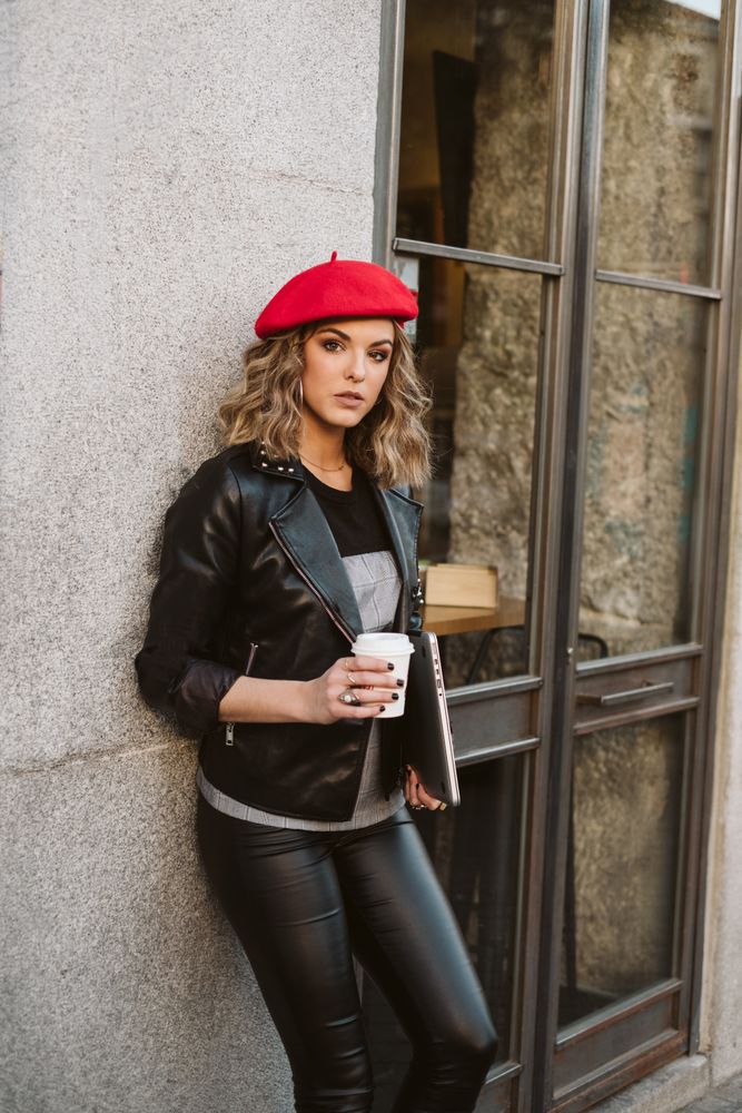 Woman with drink on the street