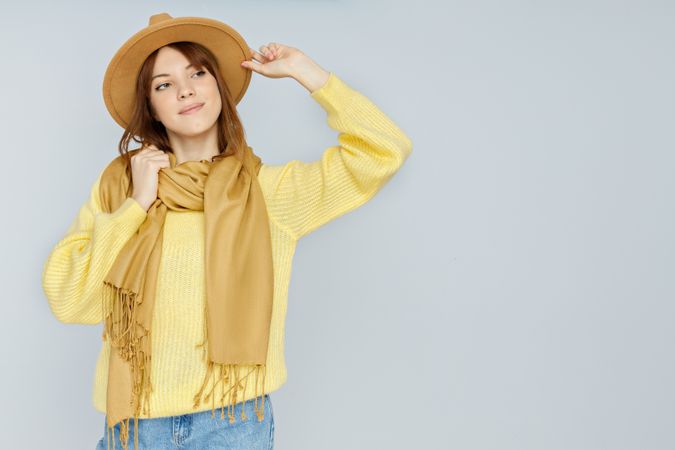 Concept of people, young woman on light gray background