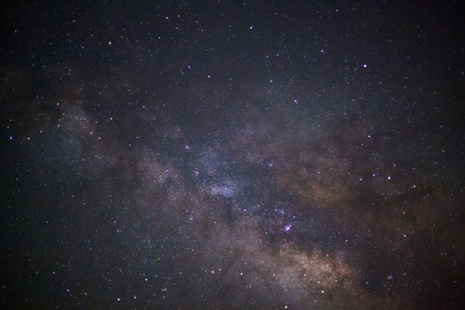 milky way galaxy with cloud and space dust in the universe, Long exposure photograph, with grain.