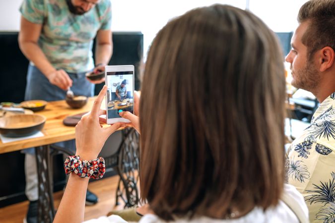 Young cook giving a cooking workshop