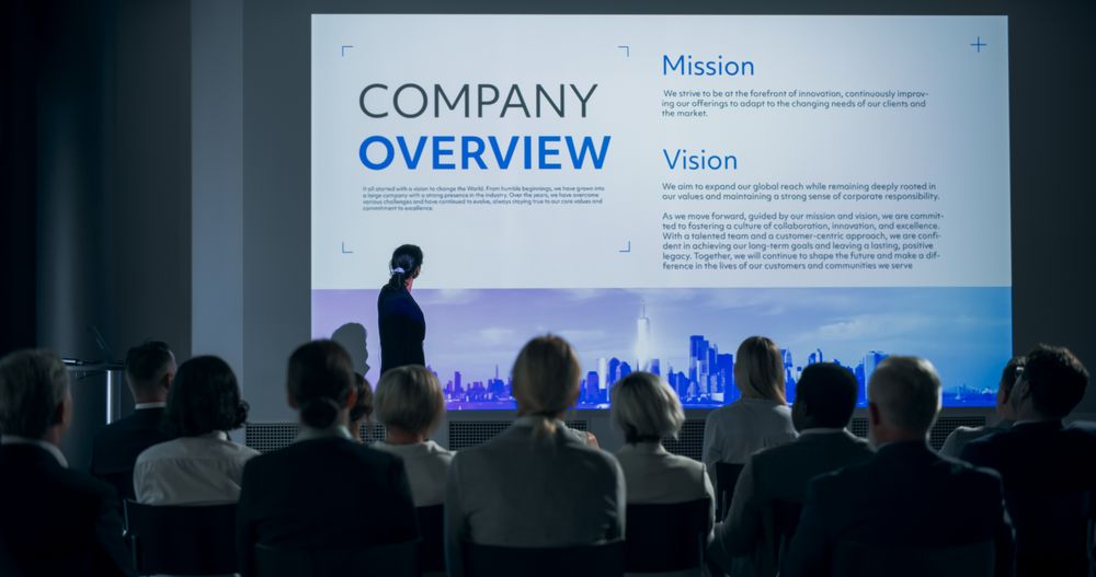 Corporate Event: White Female Tech CEO Giving Presentation To Colleagues or Investors In Conference Room Of Innovative Startup Office.