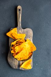 Looking down at nacho chips in bowl