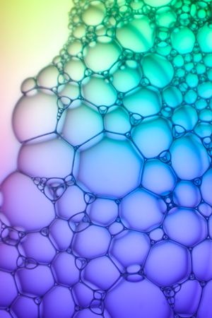Abstract background bio technology, macro photography foam and water with gradient background. Molecule multicolor backgorund
