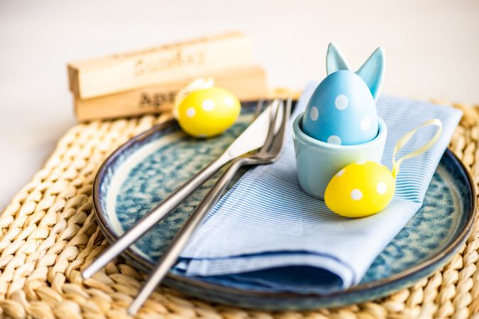 Easter holiday concept with dotted Easter eggs on table setting